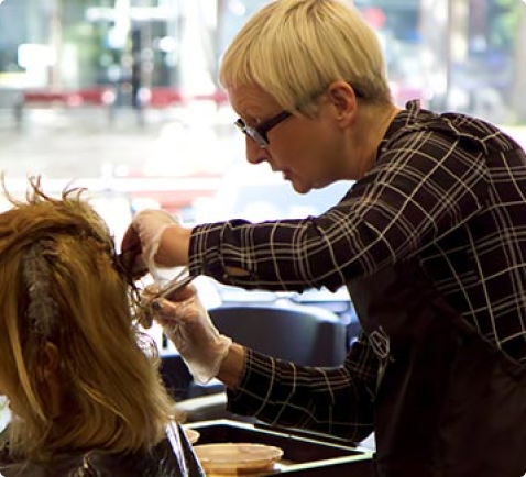Hair colouring carried out by professional stylist at a luxury Manchester hair salon