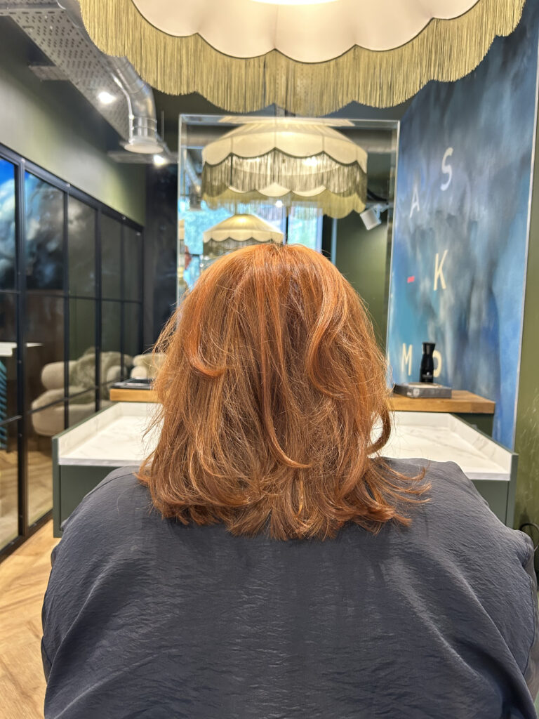 stunning ginger colour correction done on a ladies hair in manchester salon.