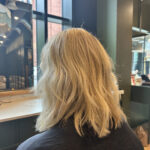 Blonde full head highlights on ladies hair in manchester hairdressers