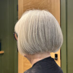 soft grey blending on a ladies hair at hairdressers manchester