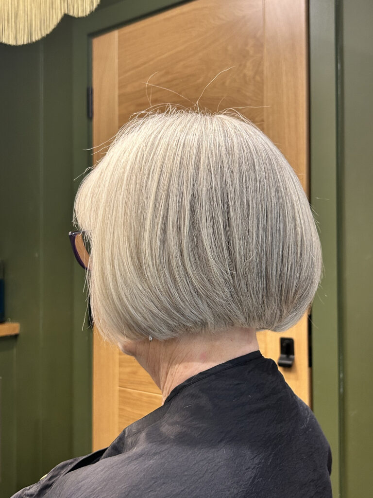 soft grey blending on a ladies hair at hairdressers manchester