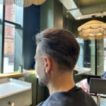 Natural looking mens hair system installed in Manchester hair salon
